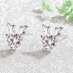Six-prong heart-shaped earrings inlaid with zircons