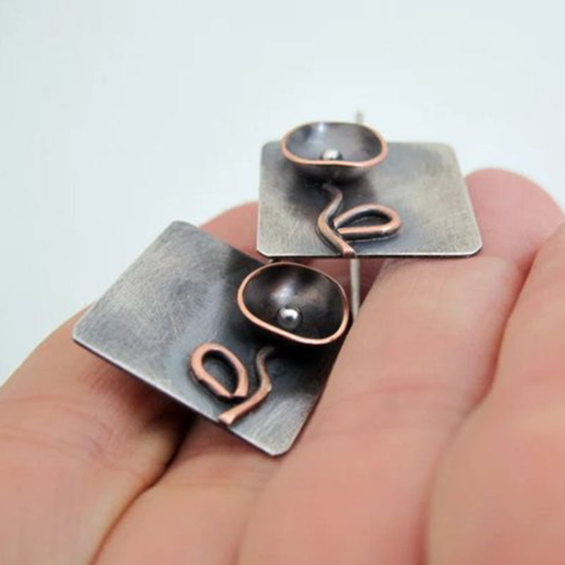 Handmade geometric floral metal earrings