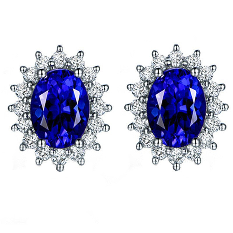 Six-prong heart-shaped earrings inlaid with zircons