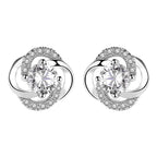 Six-prong heart-shaped earrings inlaid with zircons