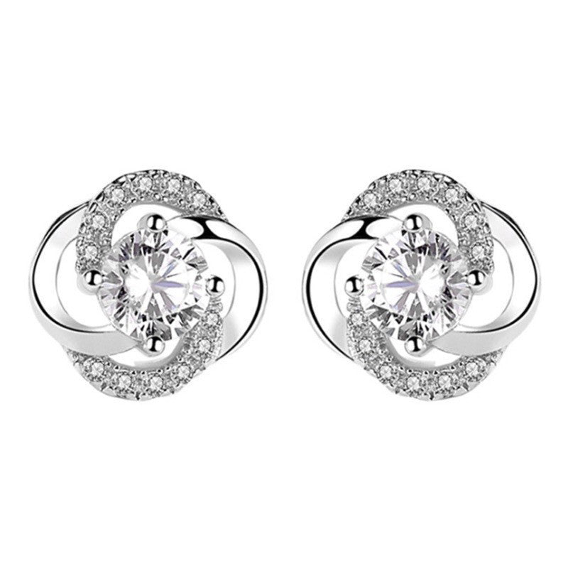 Six-prong heart-shaped earrings inlaid with zircons