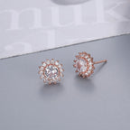 Six-prong heart-shaped earrings inlaid with zircons