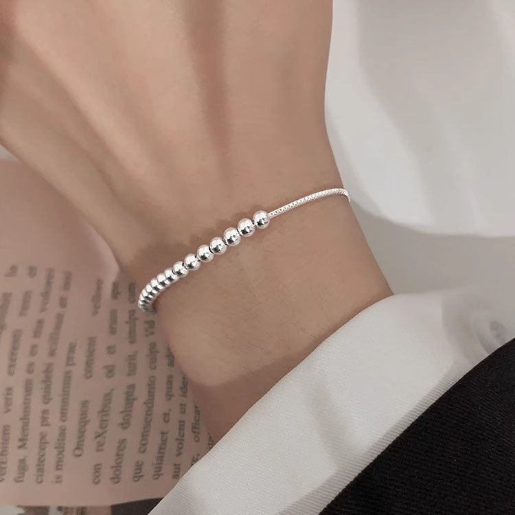 Simple and versatile silver round bead bracelet for women. New and simple