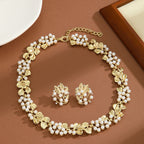 Vintage mid-antique necklace with ginkgo leaf and pearls, frosted brushed effect