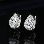 Six-prong heart-shaped earrings inlaid with zircons
