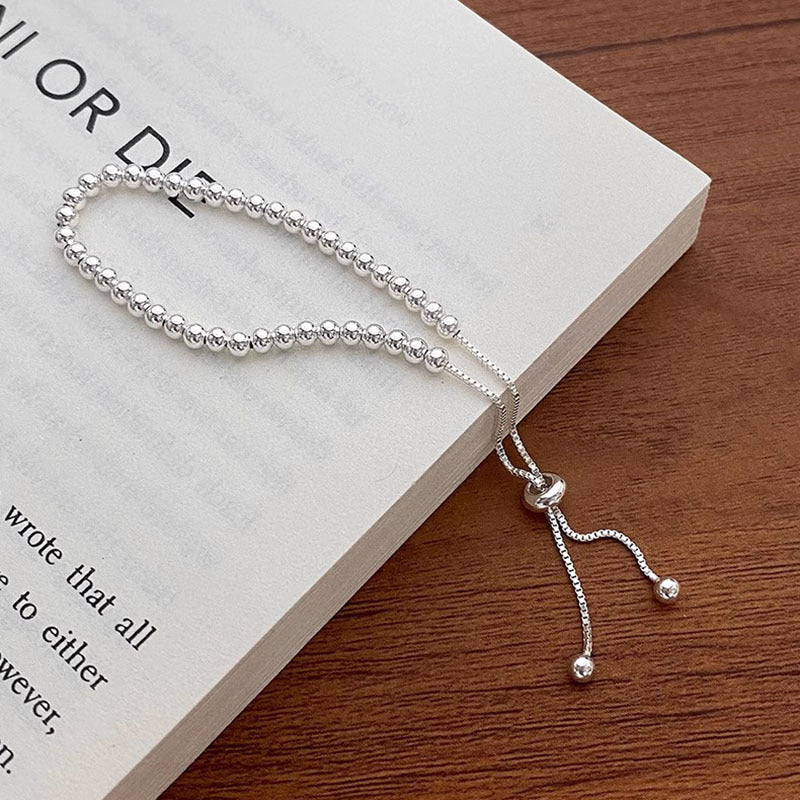 Simple and versatile silver round bead bracelet for women. New and simple