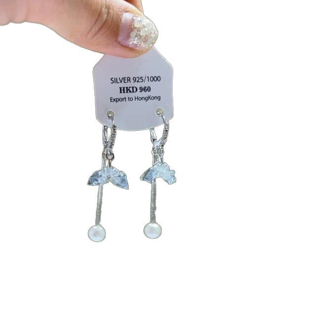 Sparkling star clip-on earrings with tassels