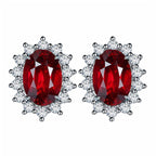 Six-prong heart-shaped earrings inlaid with zircons