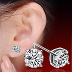 Six-prong heart-shaped earrings inlaid with zircons