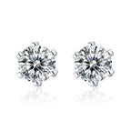 Six-prong heart-shaped earrings inlaid with zircons