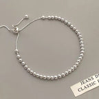 Simple and versatile silver round bead bracelet for women. New and simple