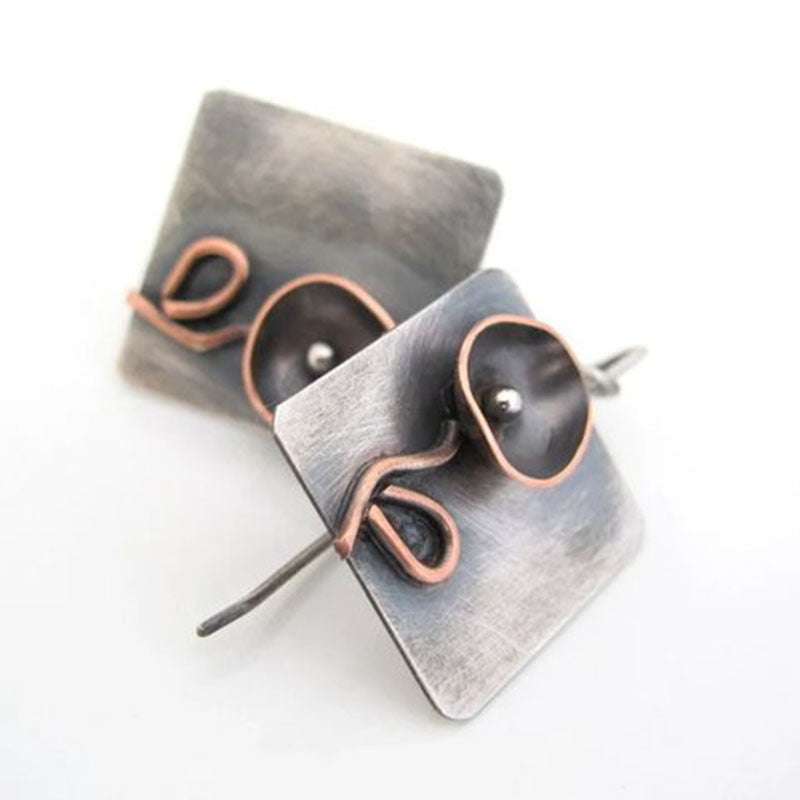 Handmade geometric floral metal earrings