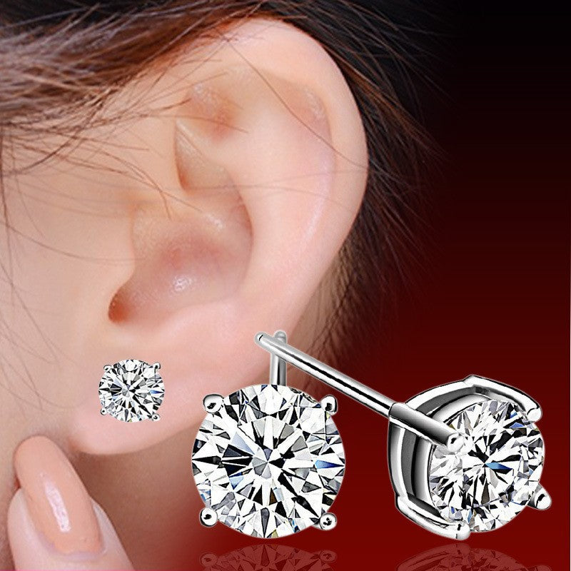 Six-prong heart-shaped earrings inlaid with zircons