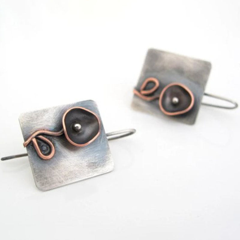 Handmade geometric floral metal earrings