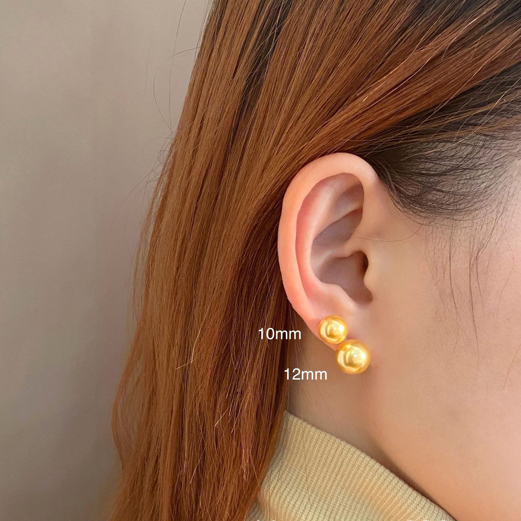 Women's large pearl stud earrings, combining style