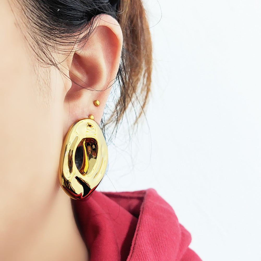 Retro metal stud earrings with irregular geometric shapes