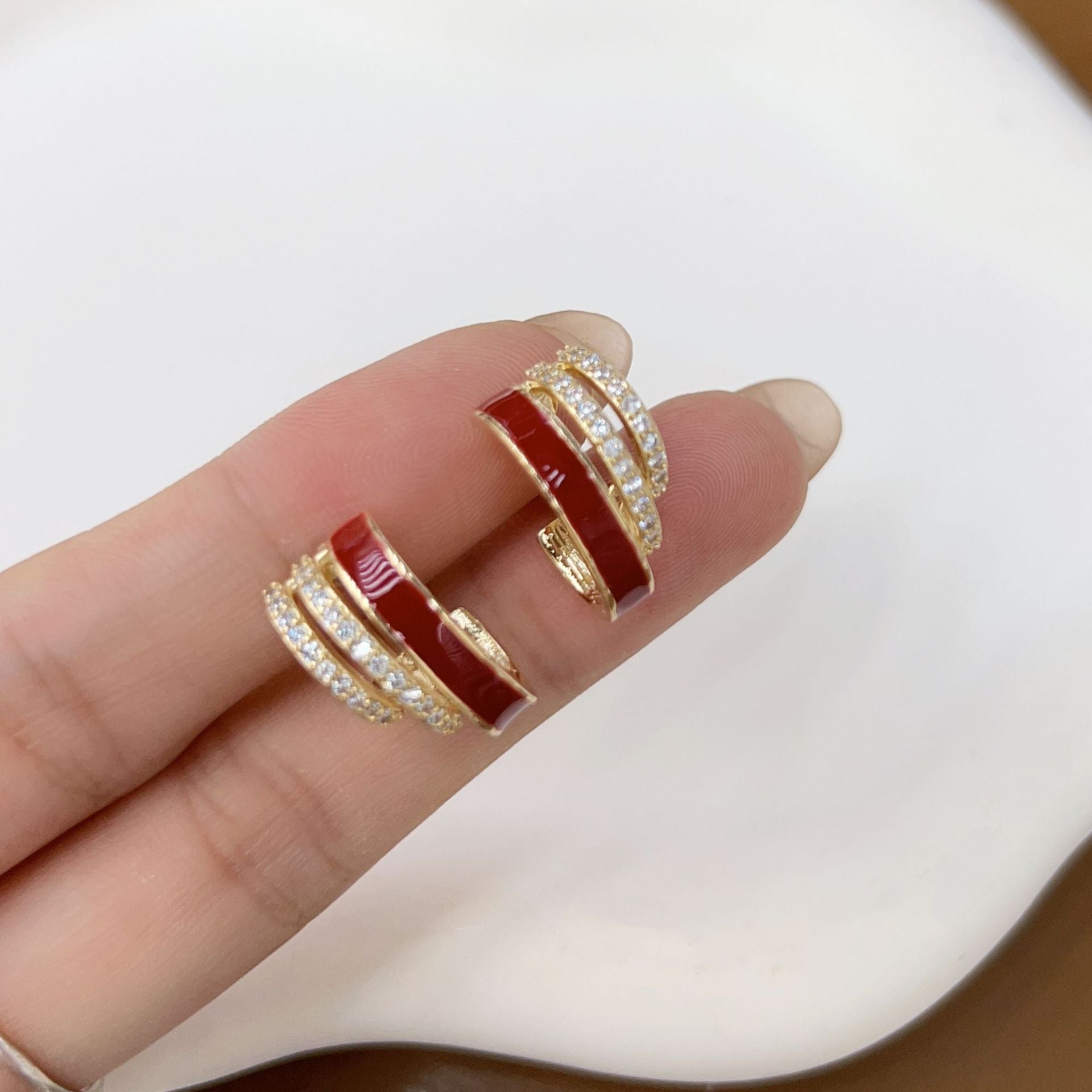 Clip-on earrings without piercing with oil painting and red diamonds