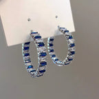 Large geometric quadrilateral hoop earrings with zircons