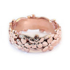 Elegant women's ring in rose gold set with zircon