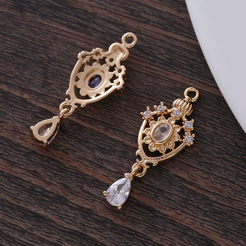 This pendant, micro-encrusted with zircon, in the shape of an openwork water drop