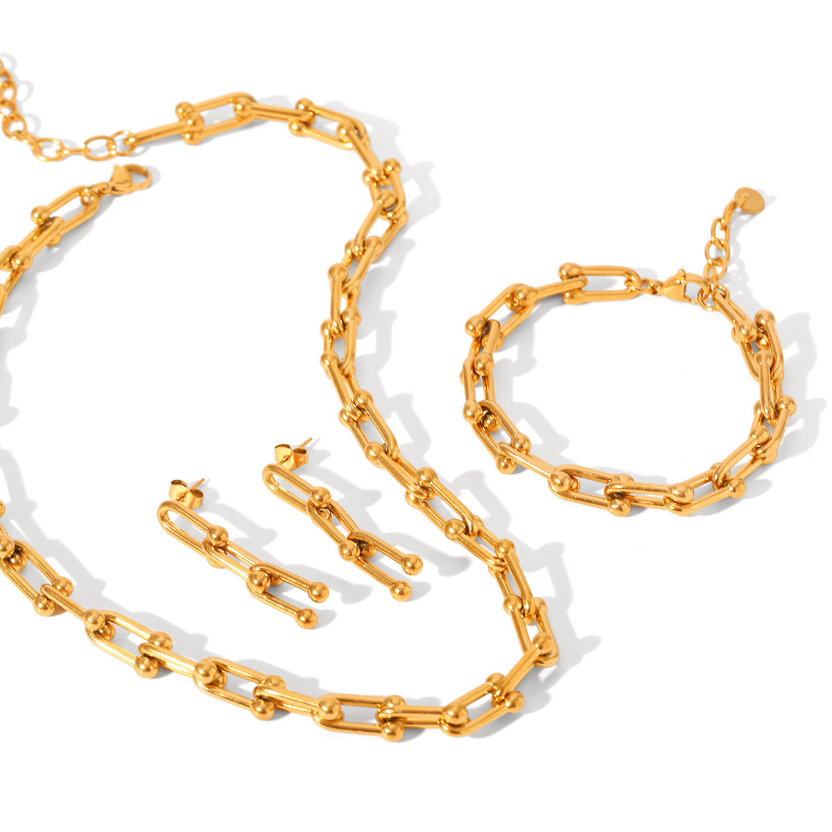Set including necklace, horseshoe chain bracelet and earrings is made of high quality stainless steel