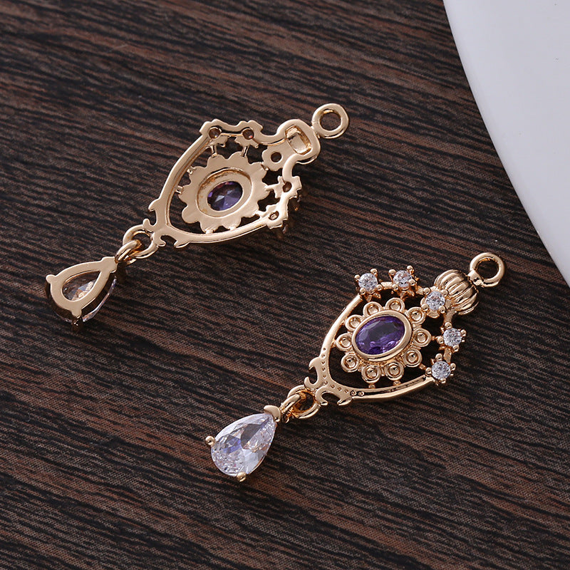 This pendant, micro-encrusted with zircon, in the shape of an openwork water drop