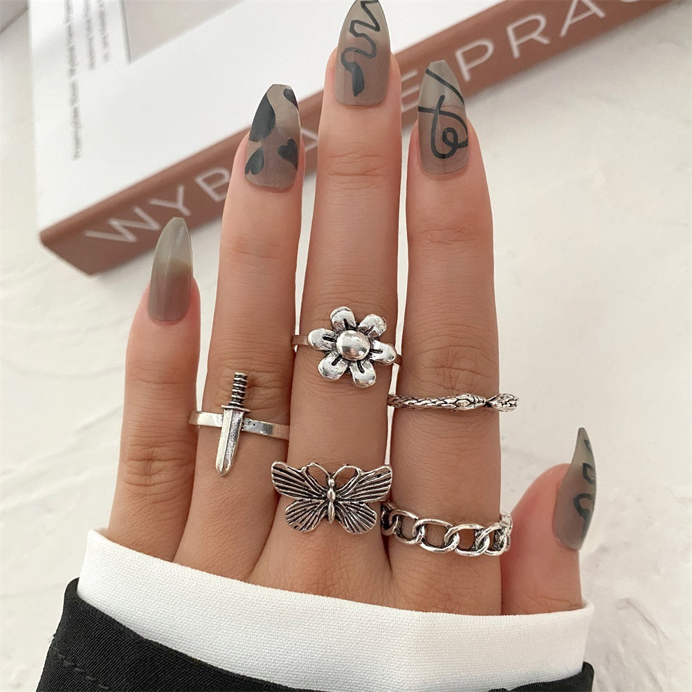 Fashionable butterfly and snake ring combination