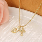 Gold Virgin Mary cross necklace
