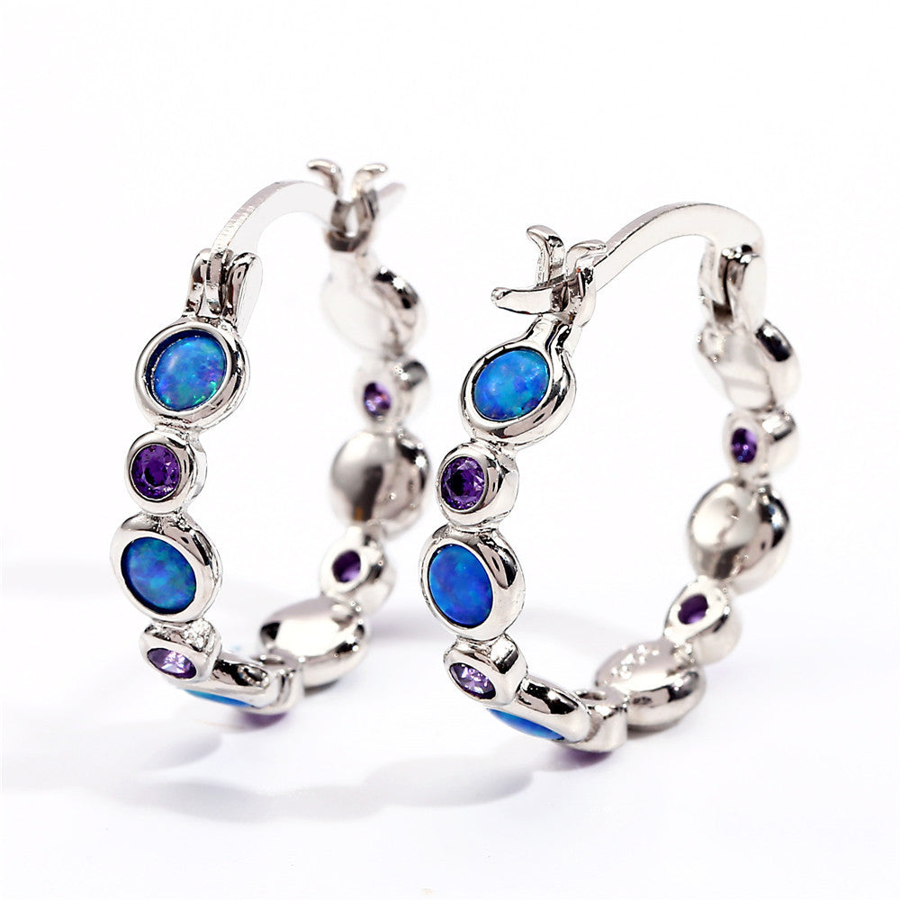 Earrings combine brilliance and delicacy, enhancing
