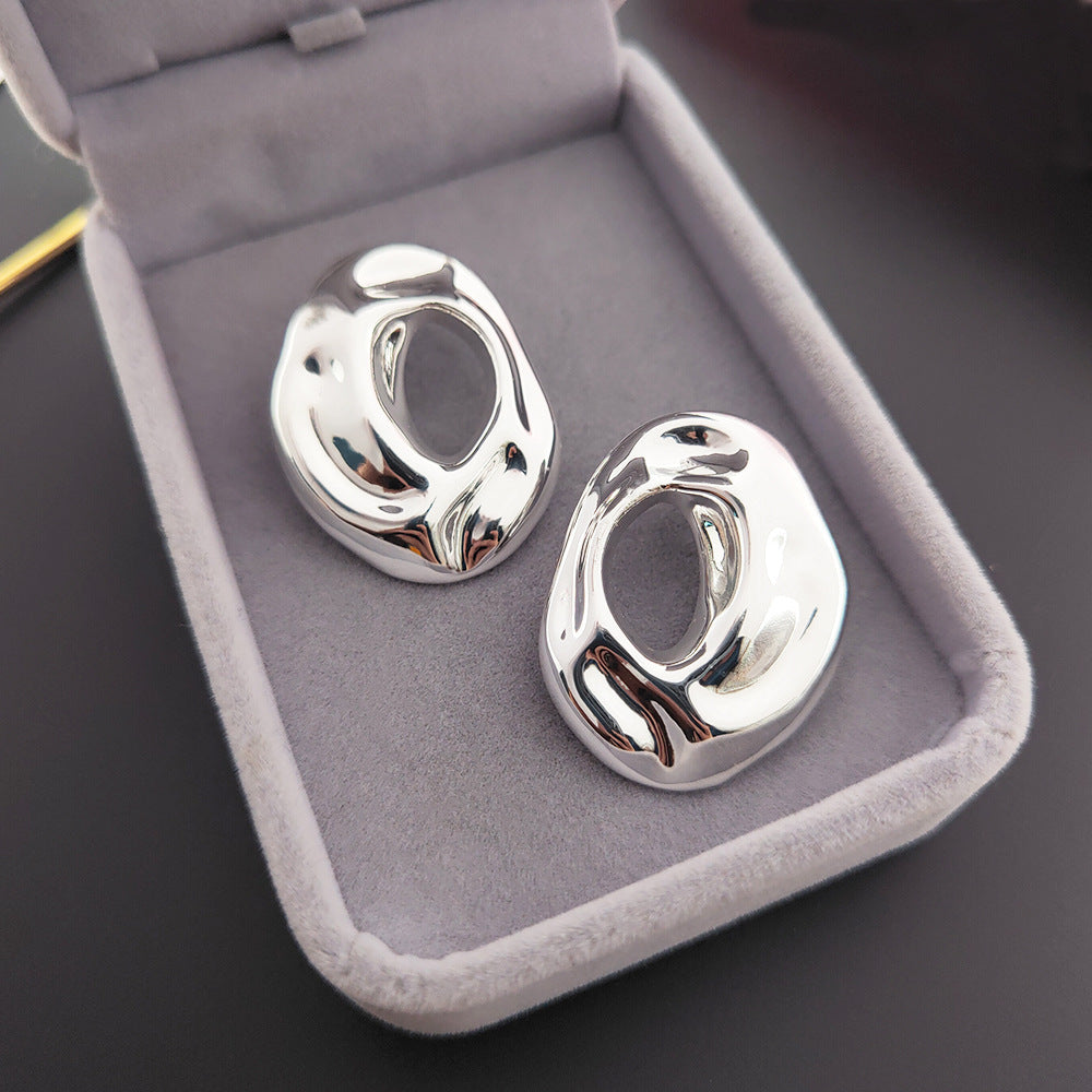 Retro metal stud earrings with irregular geometric shapes