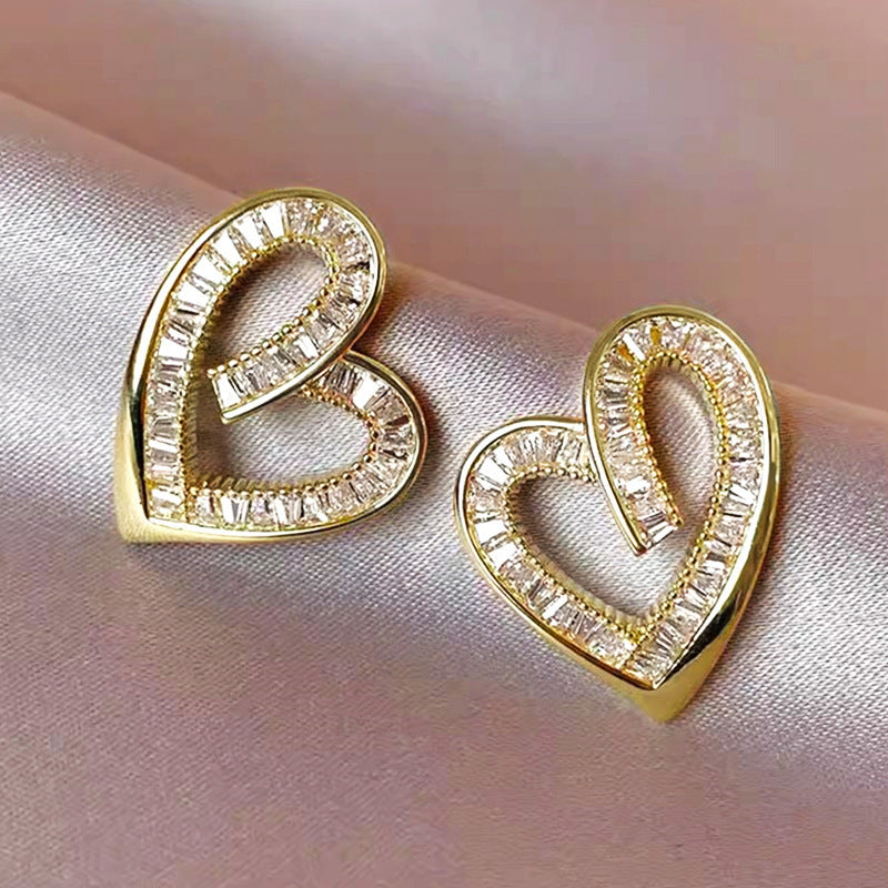 Elegant hollow heart shaped earrings with geometric design