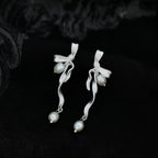 Boucles d’oreilles clous en forme de nœud, ornées de perles délicates - NovaShop NovaShop Silver / 925 Silver Bigbuy