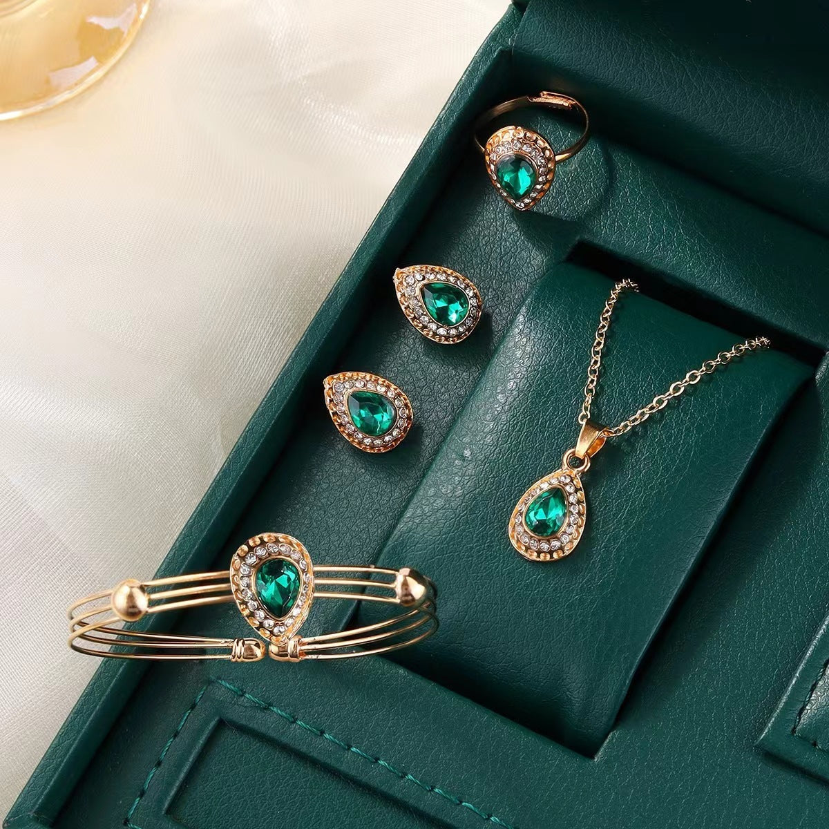 Jewelry set: matching necklace, earrings, ring and bracelet