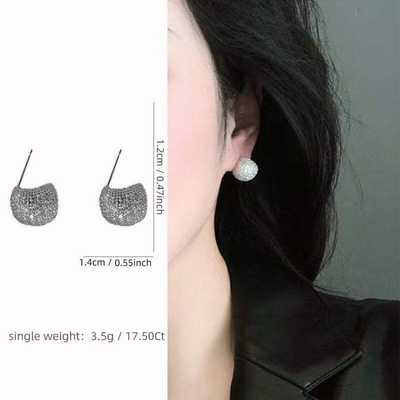 Light luxury clip-on earrings in the shape of small golden pearls adorned with diamonds
