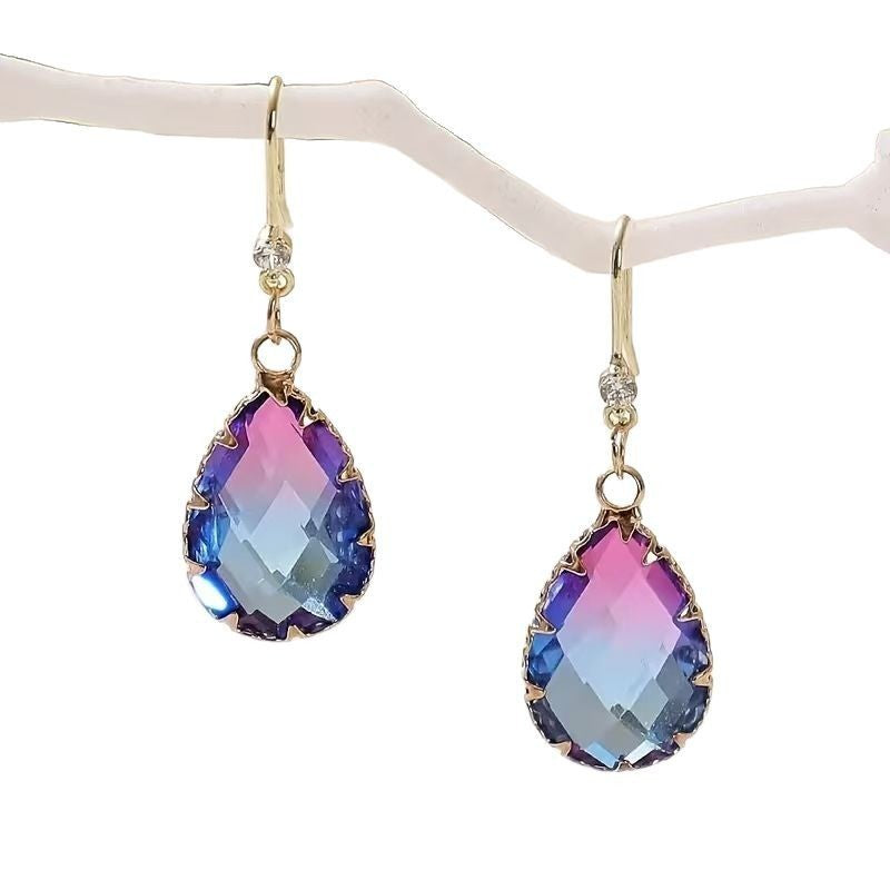 Fashion Crystal Glass Love Heart Women's Earrings These elegant heart-shaped earrings are designed to enhance every woman.