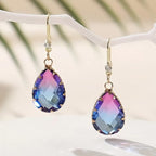 Fashion Crystal Glass Love Heart Women's Earrings These elegant heart-shaped earrings are designed to enhance every woman.