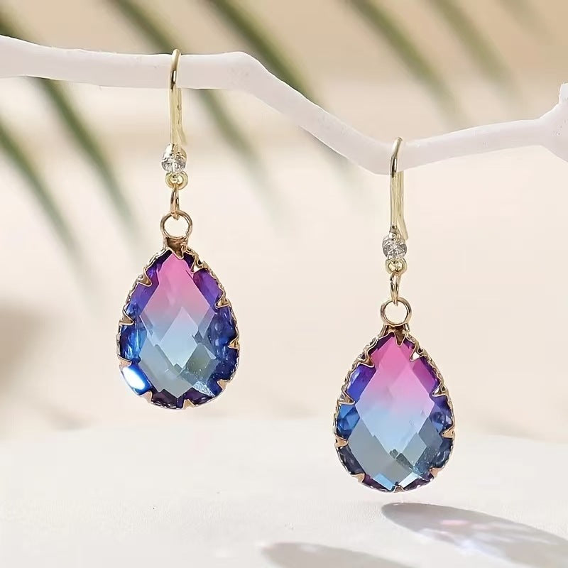 Fashion Crystal Glass Love Heart Women's Earrings These elegant heart-shaped earrings are designed to enhance every woman.