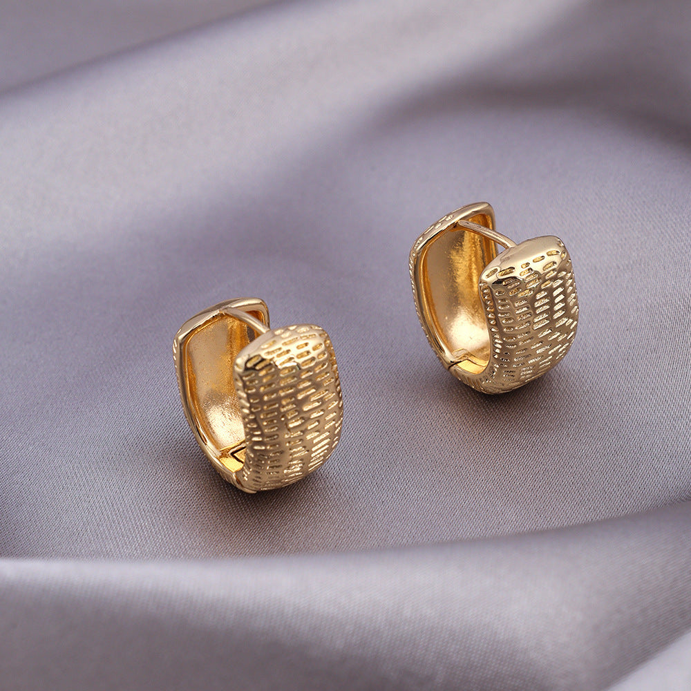 Micro-zircon, woven, twisted, gold-plated, lightweight, luxurious and high-end stud earrings