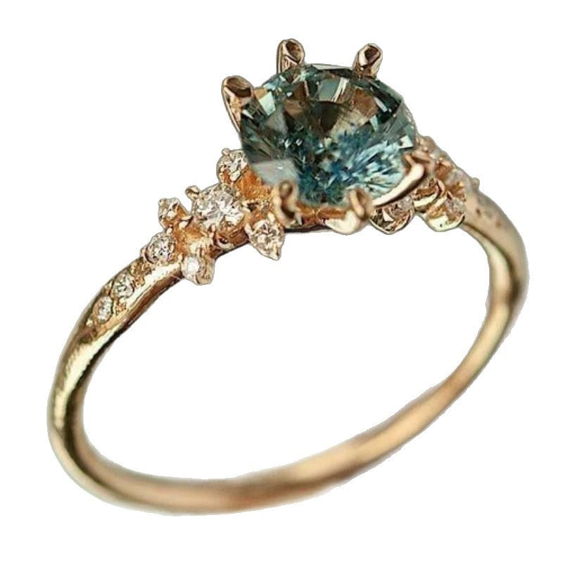 Creatively designed gold-plated ring, enhanced by a meticulous setting of zircons