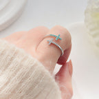Open cross ring for women combines modernity and elegance